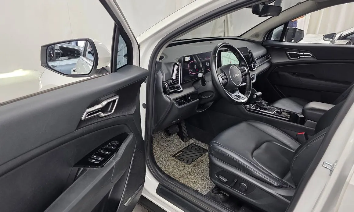 Kia Sportage — фото 9