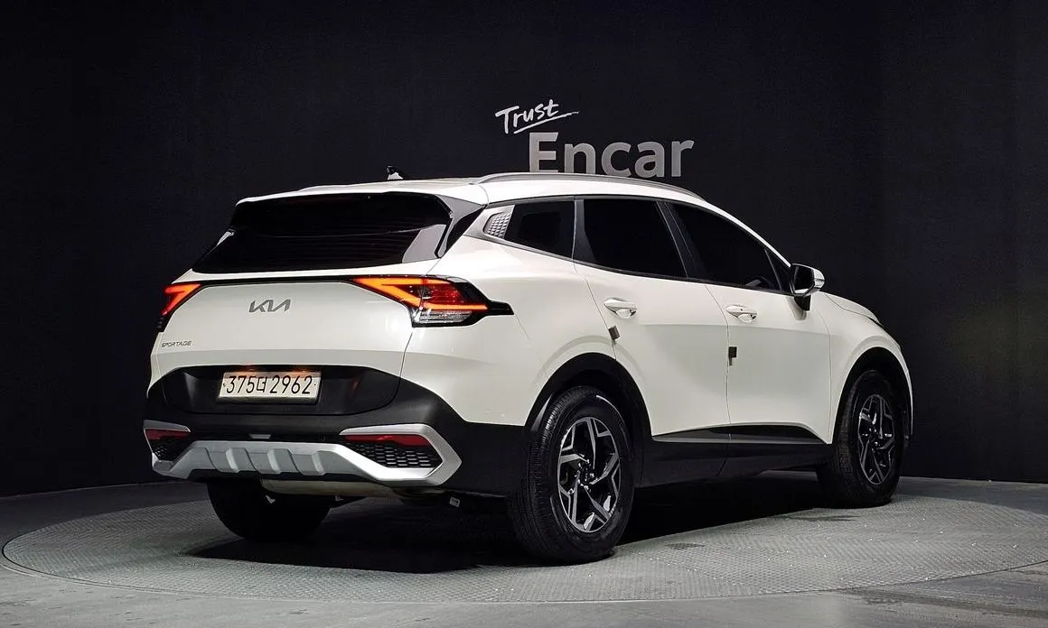 Kia Sportage — фото 8