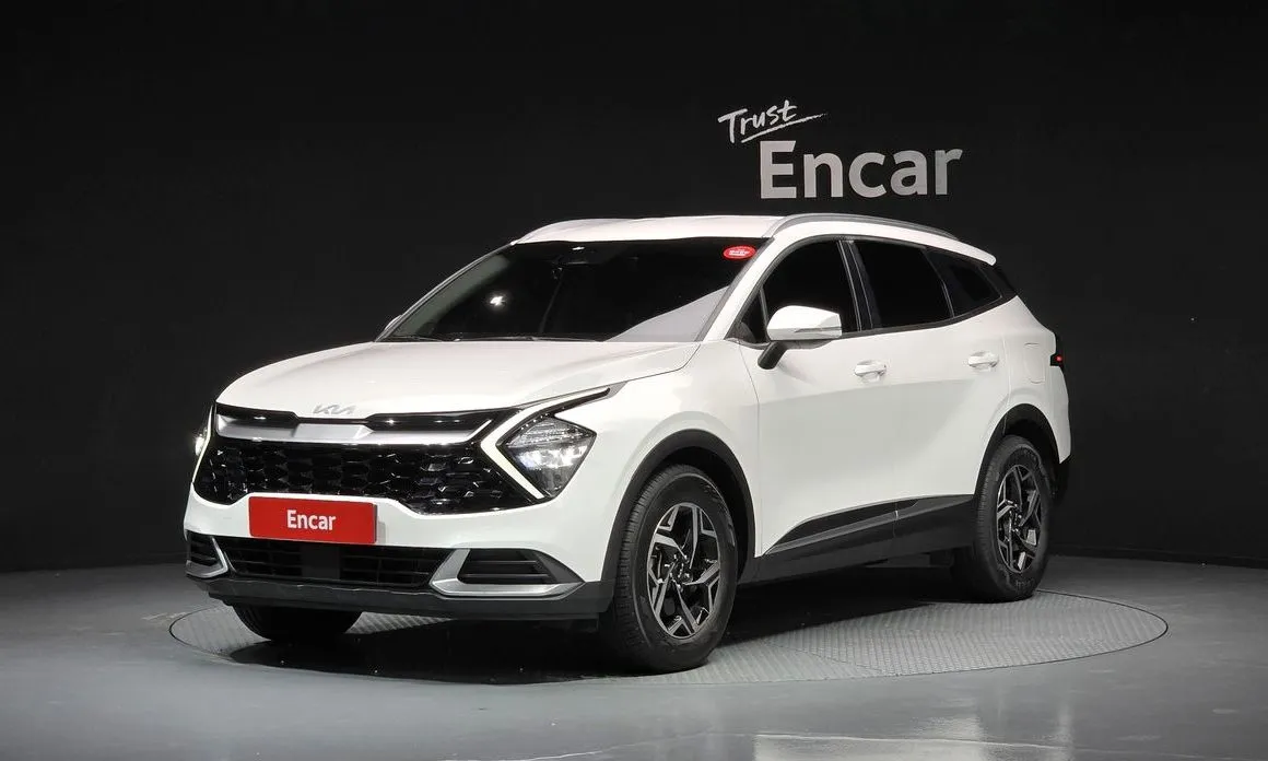 Kia Sportage — фото 1
