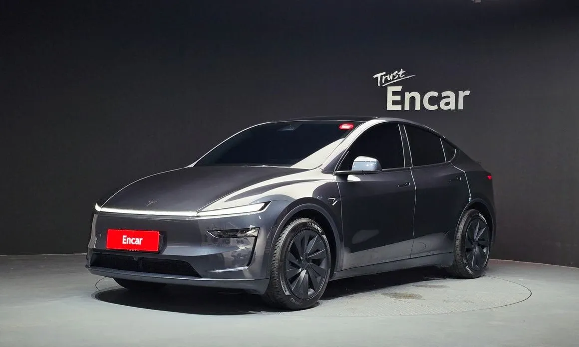 Tesla Model Y — фото 1