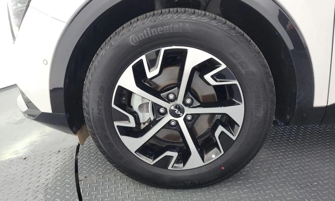 Kia Sportage — фото 10