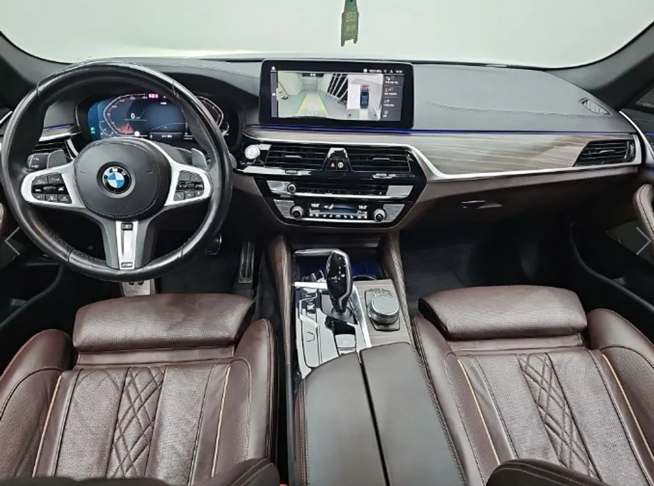BMW 5-Series — фото 10