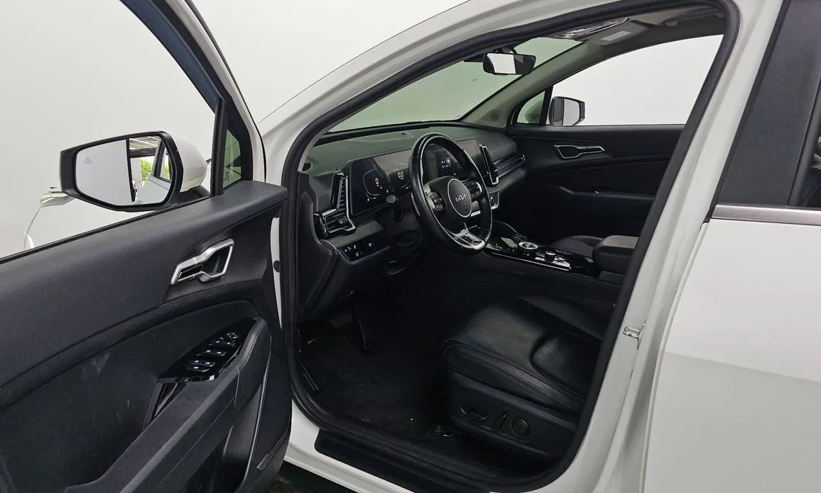 Kia Sportage — фото 10