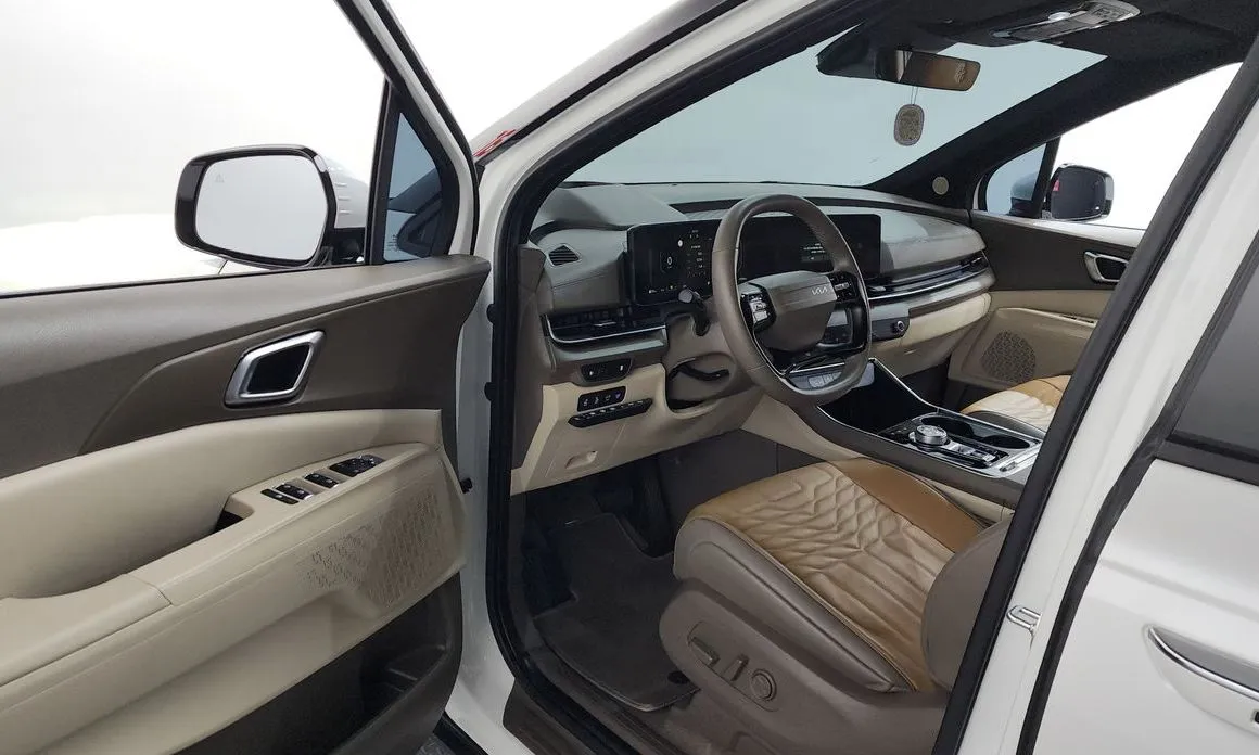 Kia Carnival — фото 10