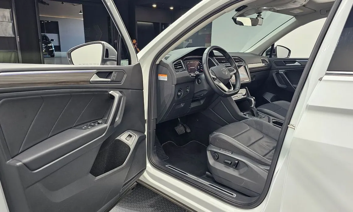 Volkswagen Tiguan — фото 7