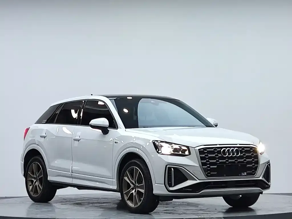 Audi Q2L — фото 7