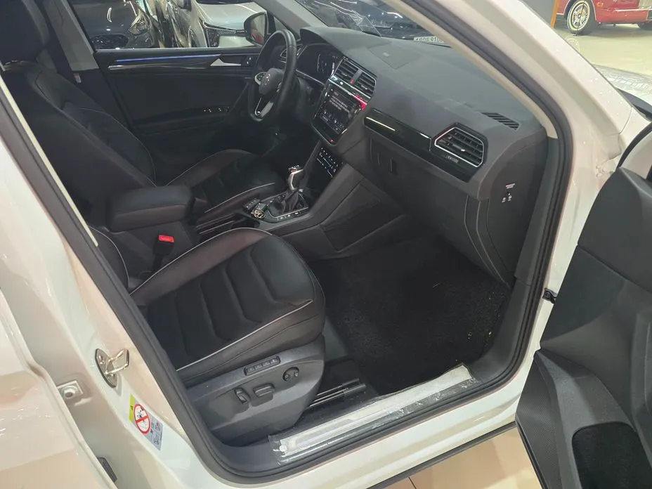 Volkswagen Tiguan — фото 10