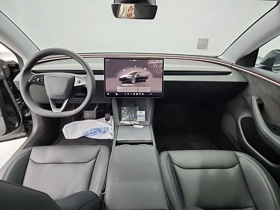 Tesla Model 3 — фото 9
