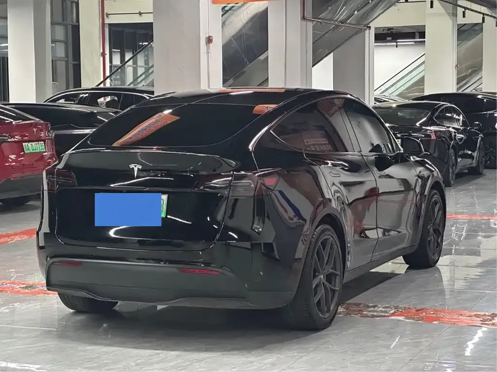 Tesla Model Y — фото 7
