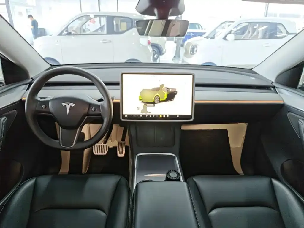Tesla Model Y — фото 10