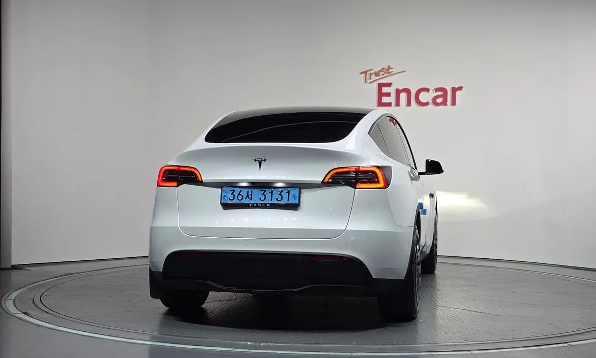 Tesla Model Y — фото 7