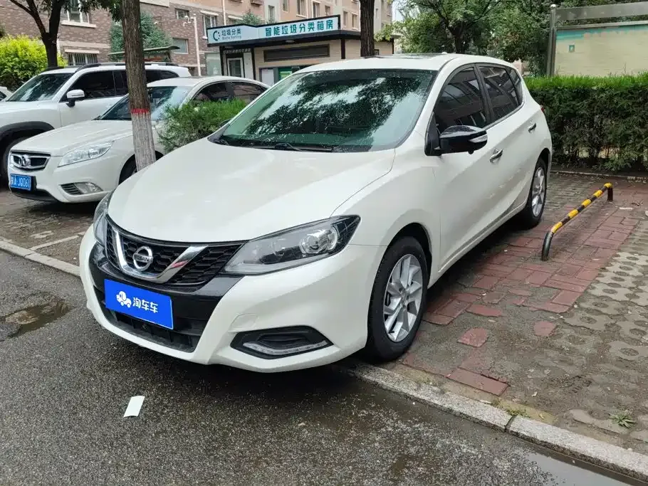 Nissan Tiida — фото 1