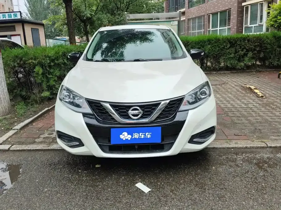 Nissan Tiida — фото 10