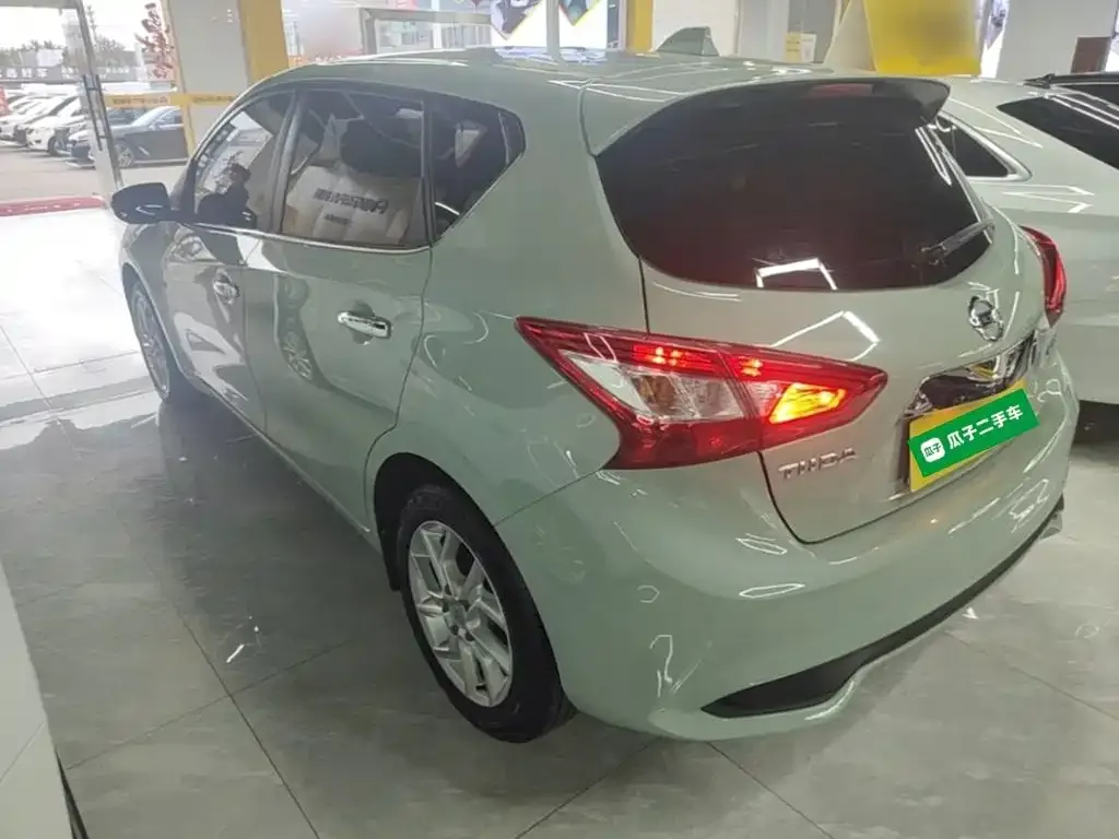 Nissan Tiida — фото 3