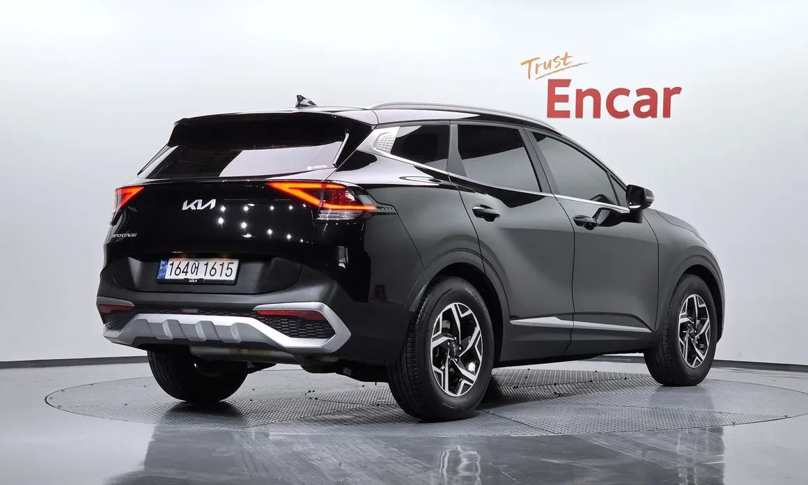Kia Sportage — фото 10