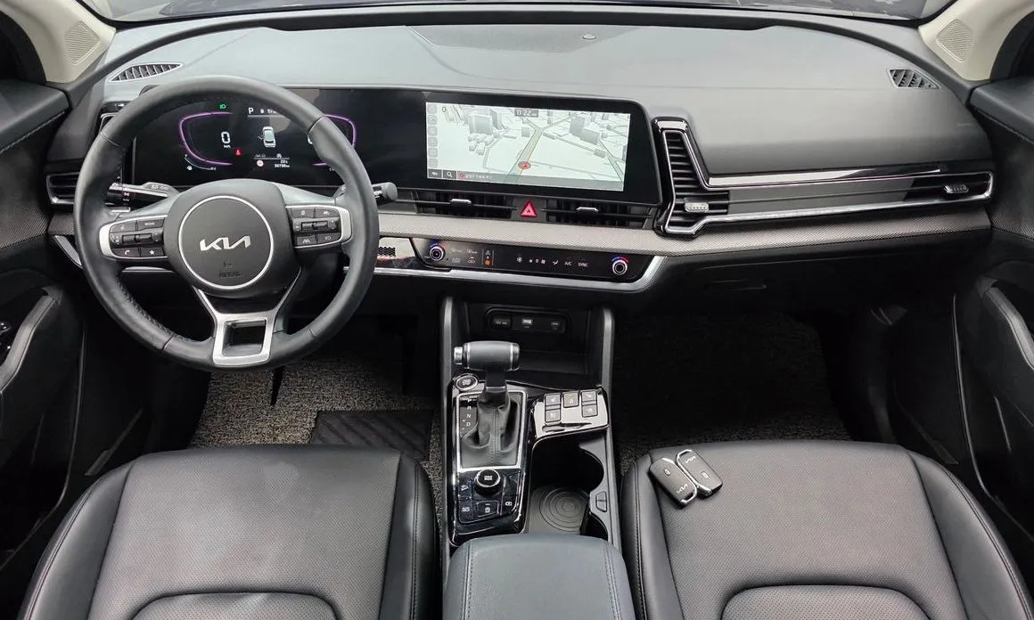 Kia Sportage — фото 8