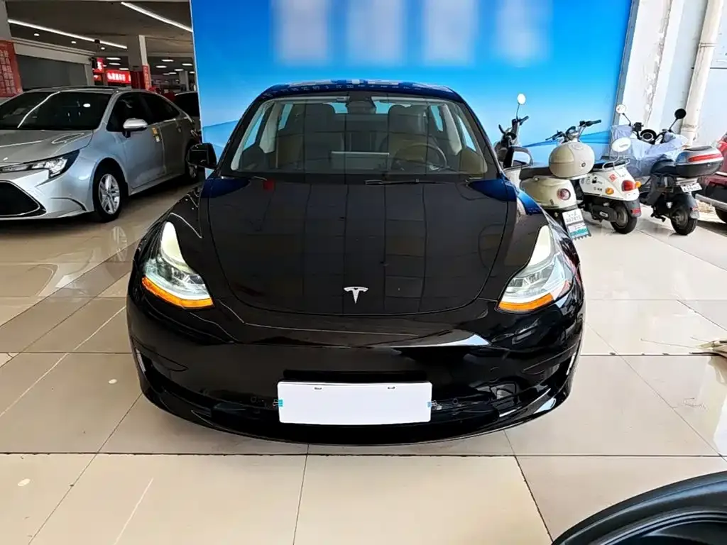 Tesla Model 3 — фото 4