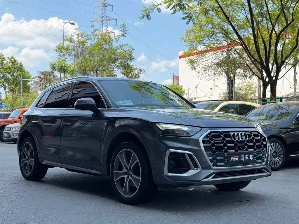 Audi Q5L — фото 10