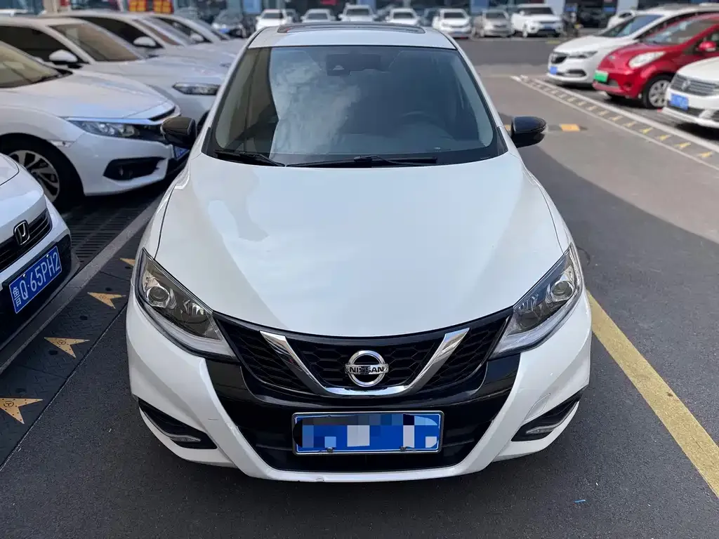 Nissan Tiida — фото 10