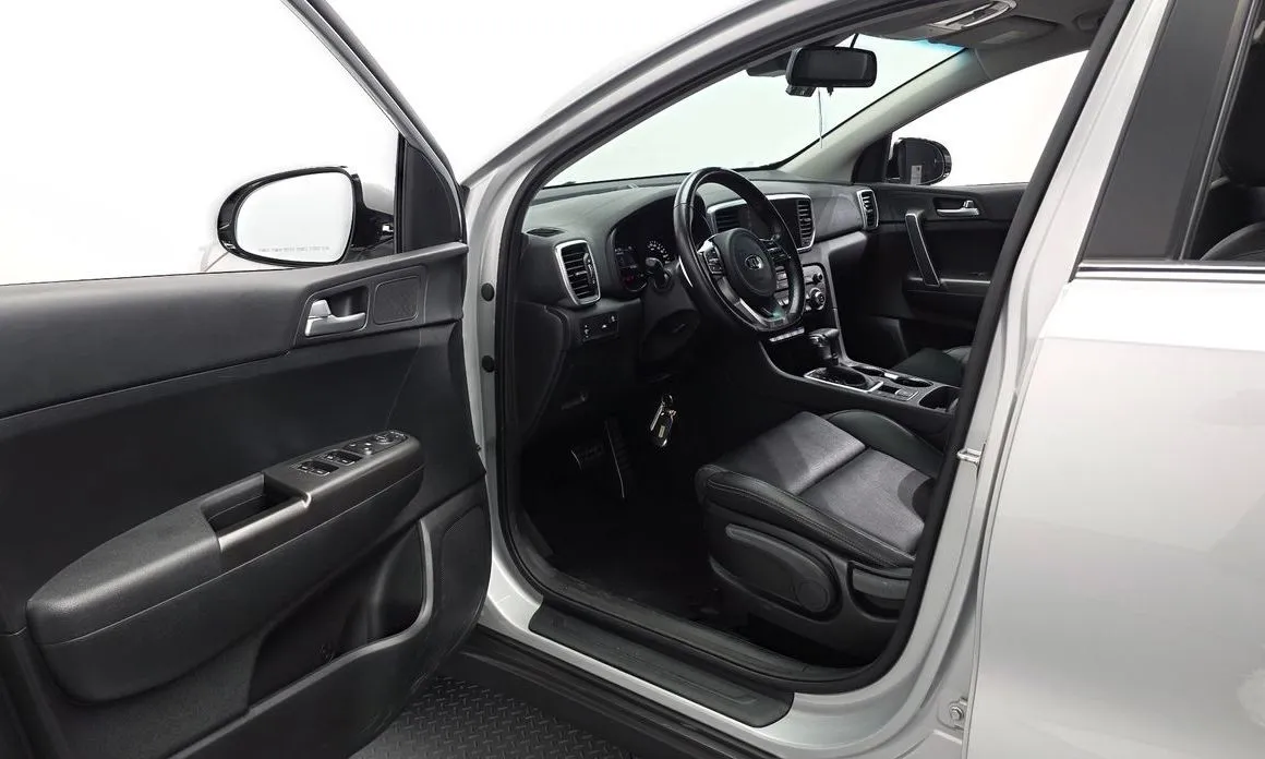 Kia Sportage — фото 10