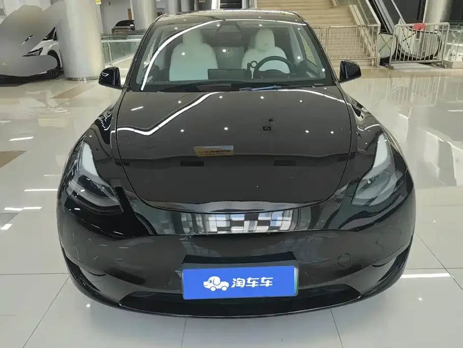Tesla Model Y — фото 9