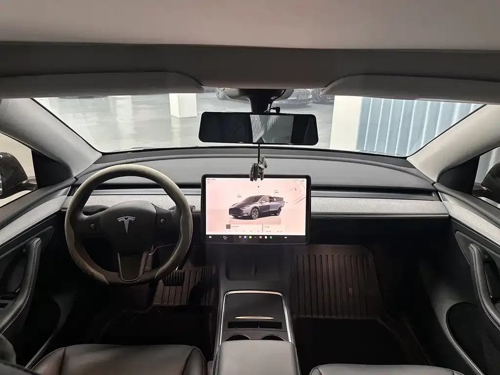 Tesla Model Y — фото 7