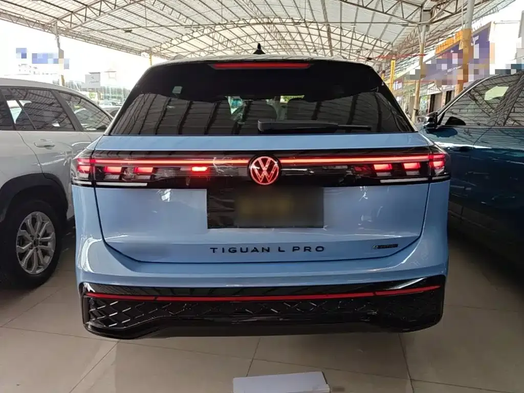Volkswagen Tiguan L — фото 4