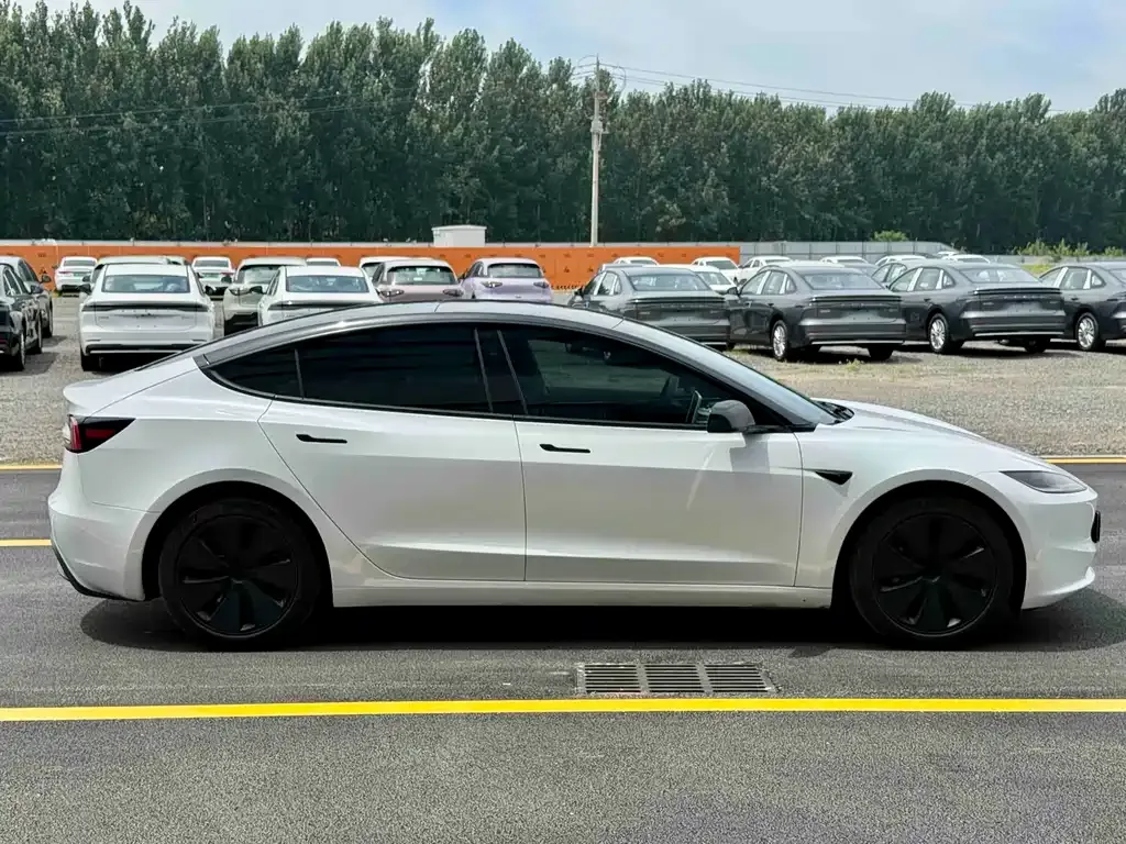 Tesla Model 3 — фото 7