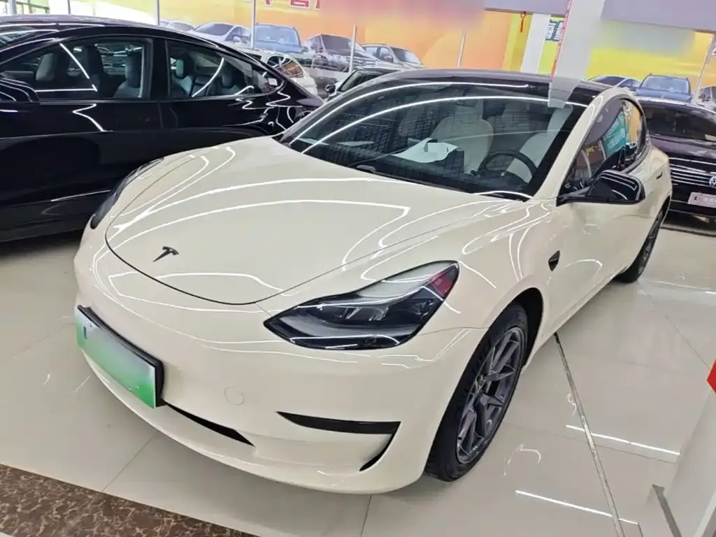 Tesla Model 3 — фото 10