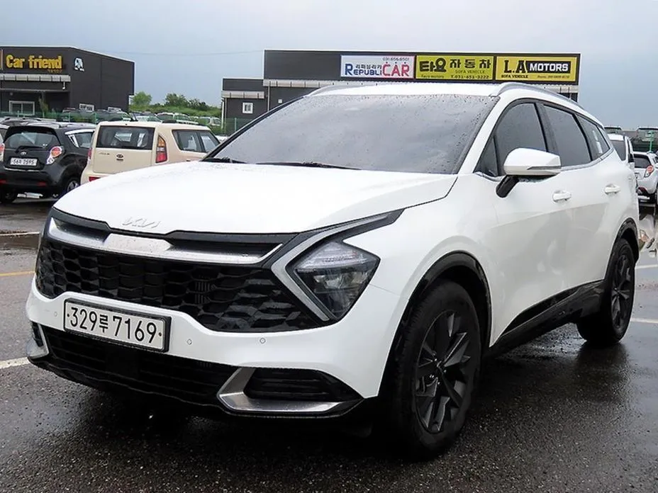 Kia Sportage — фото 7