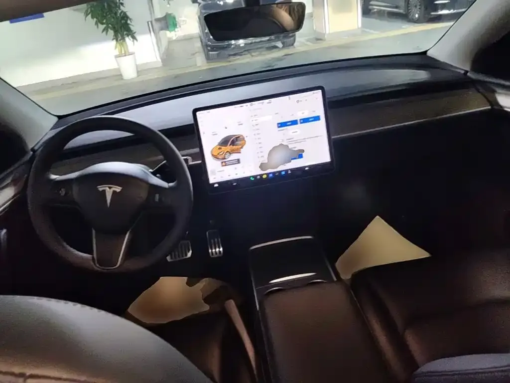 Tesla Model Y — фото 10