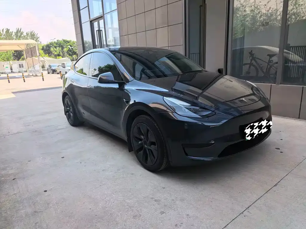 Tesla Model Y — фото 6