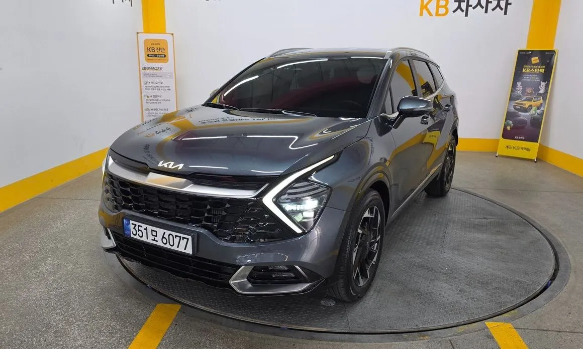 Kia Sportage — фото 1