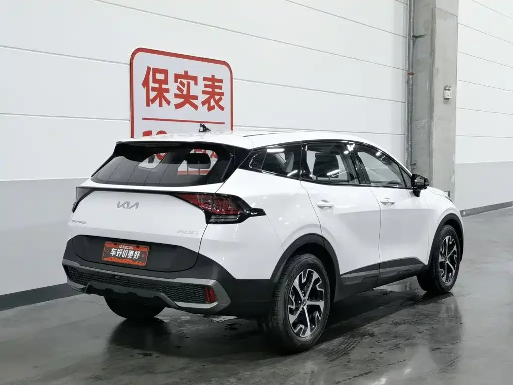 Kia Sportage — фото 8