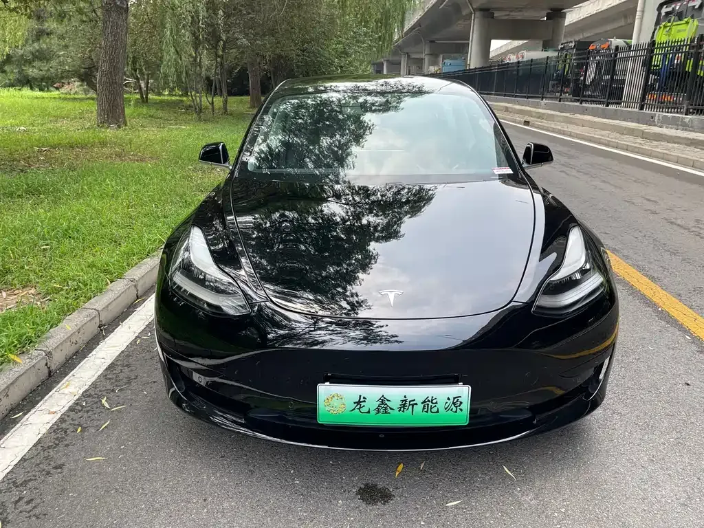Tesla Model 3 — фото 9