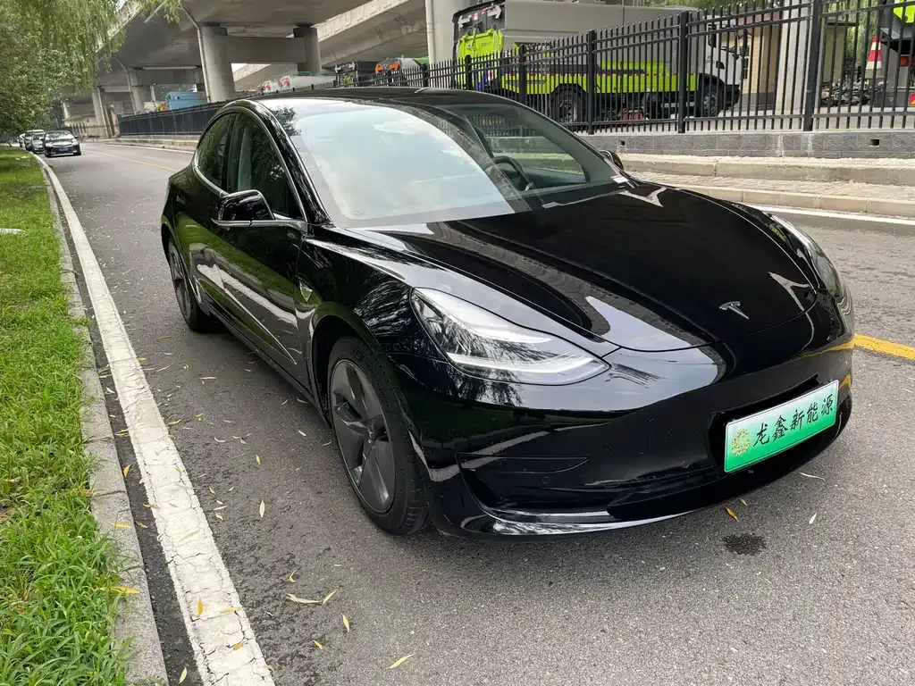 Tesla Model 3 — фото 8