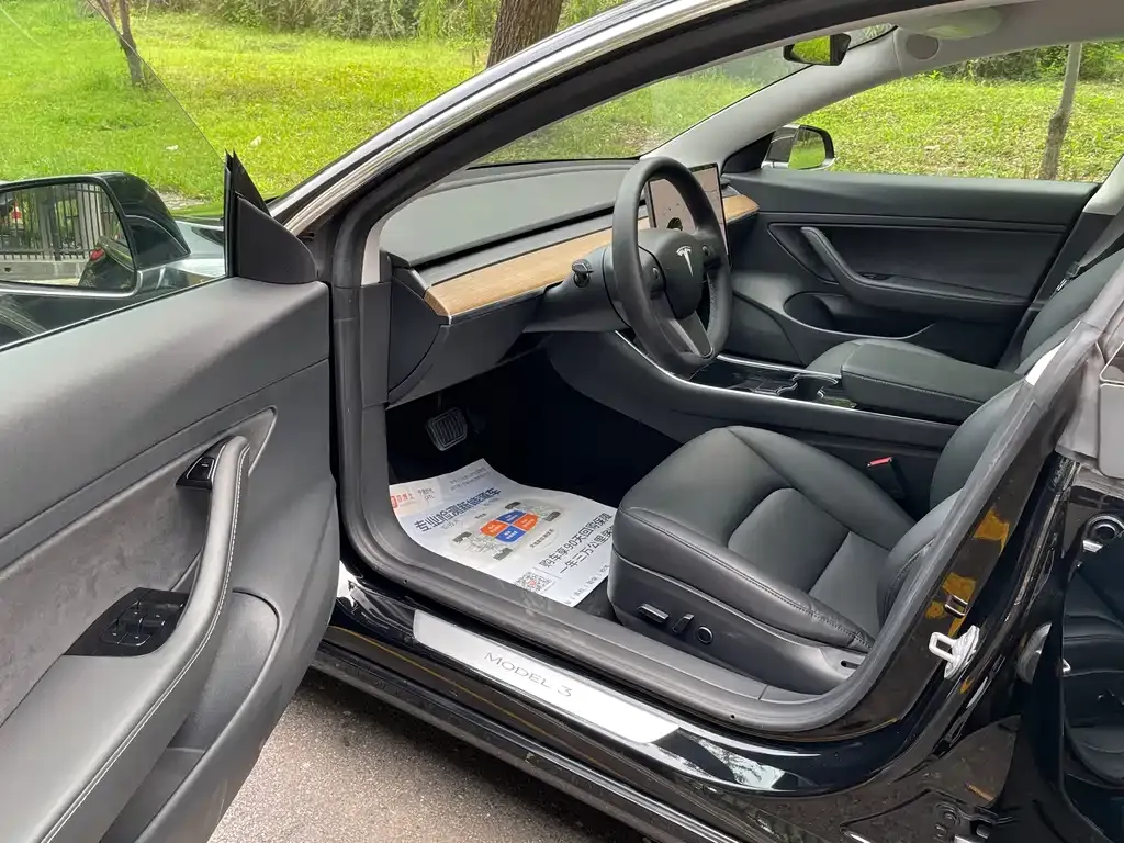 Tesla Model 3 — фото 6