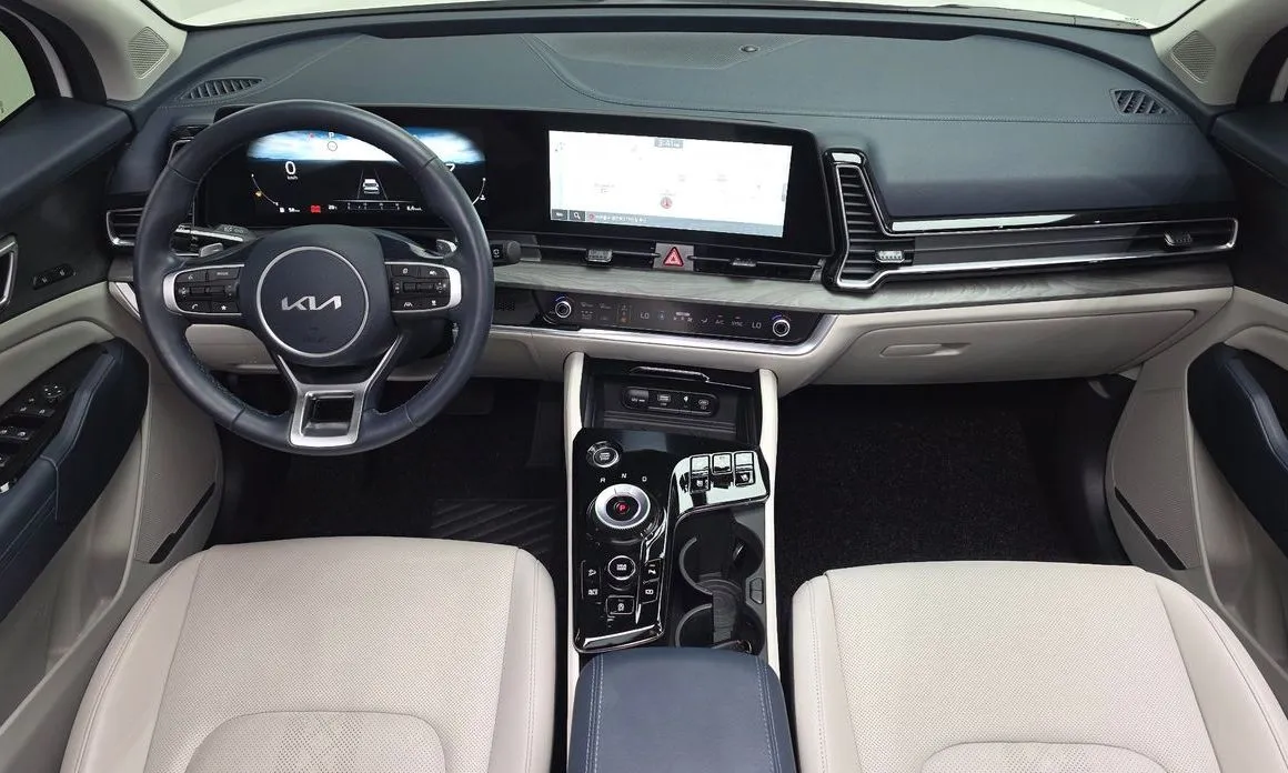 Kia Sportage — фото 10