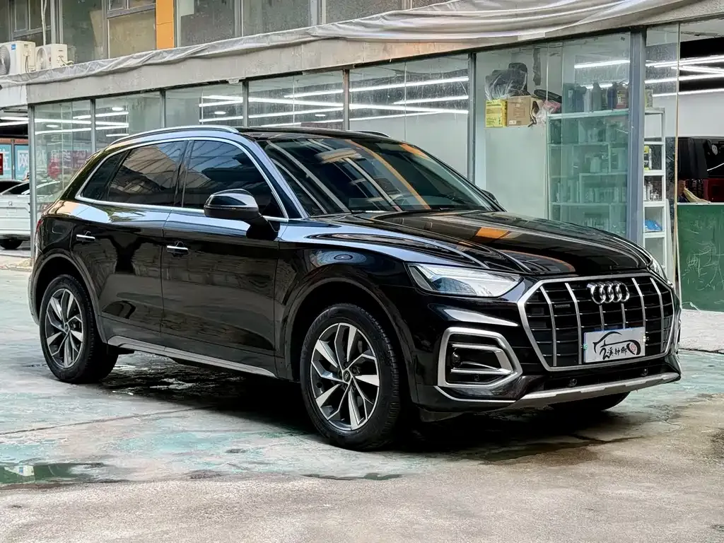Audi Q5L — фото 8