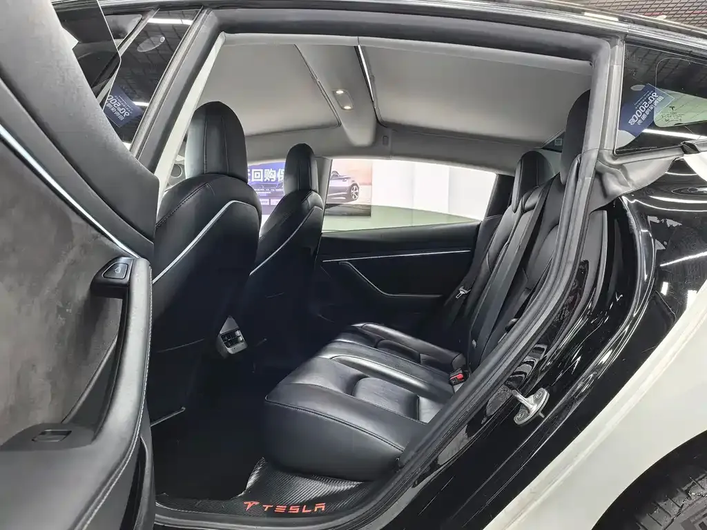 Tesla Model 3 — фото 10