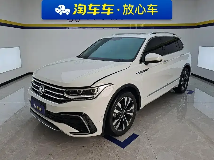 Volkswagen Tiguan L — фото 1