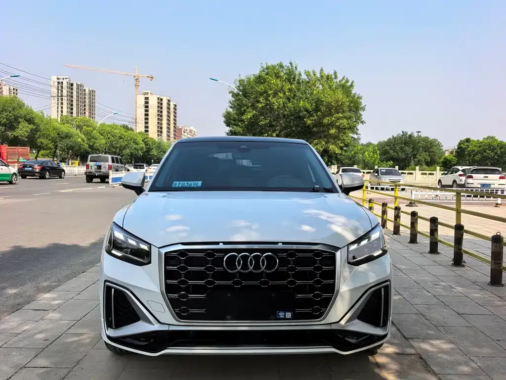 Audi Q2L — фото 7