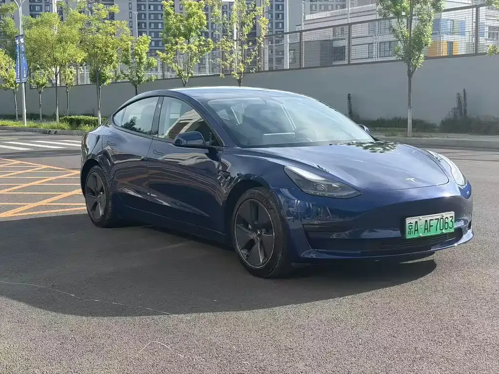 Tesla Model 3 — фото 10