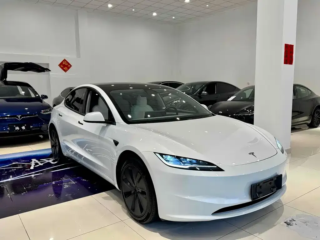 Tesla Model 3 — фото 9