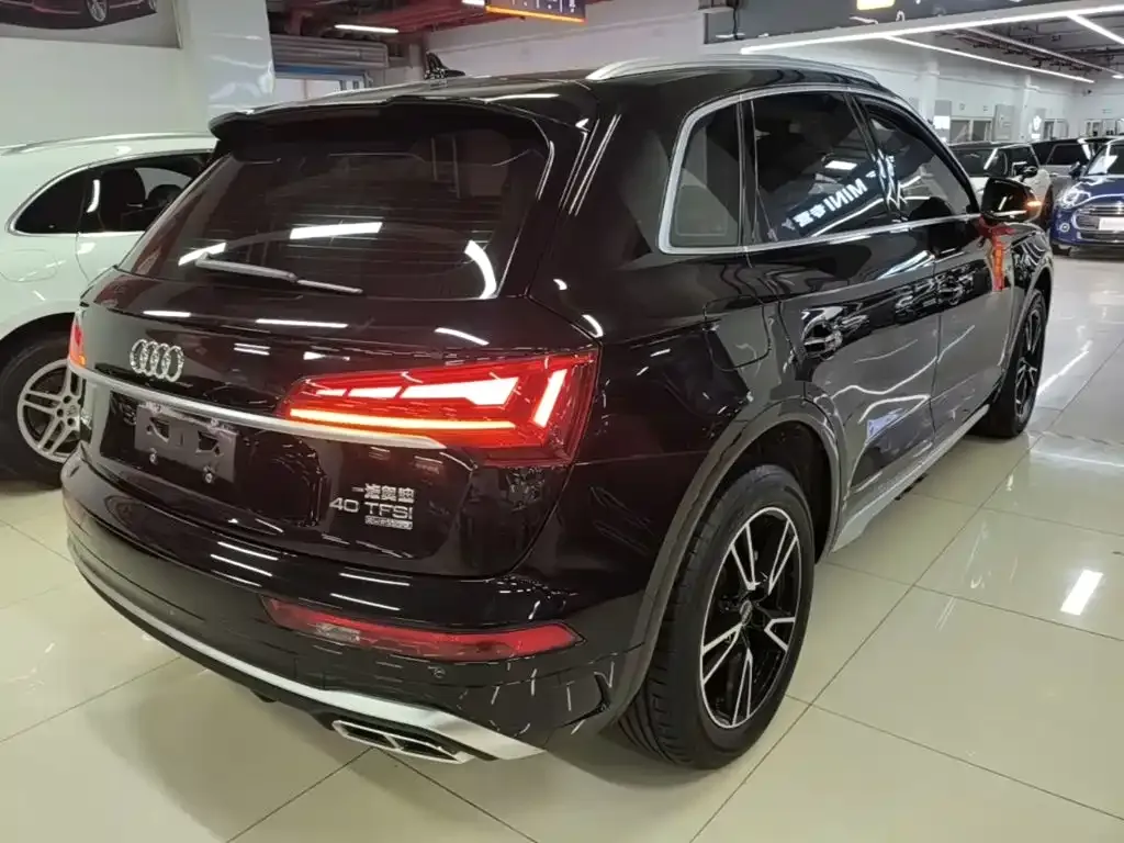 Audi Q5L — фото 10