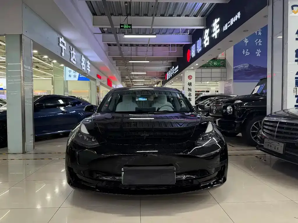 Tesla Model 3 — фото 7