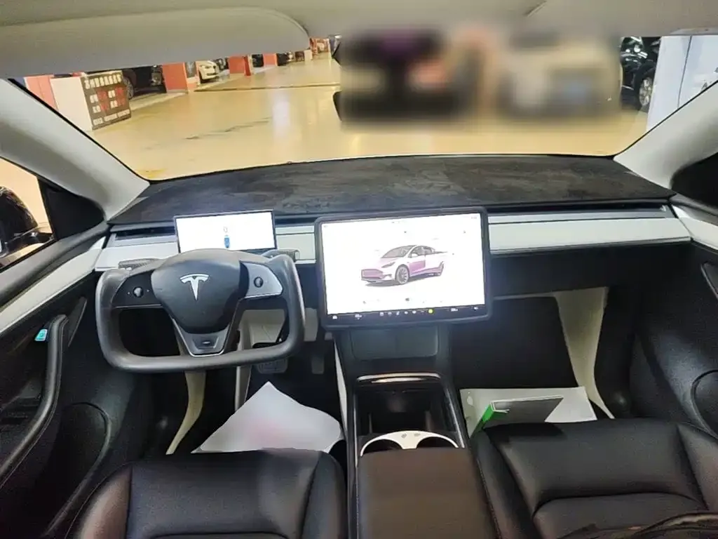 Tesla Model Y — фото 10
