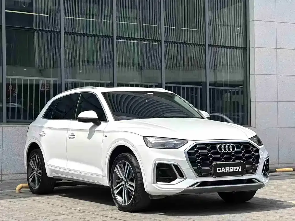 Audi Q5L — фото 10