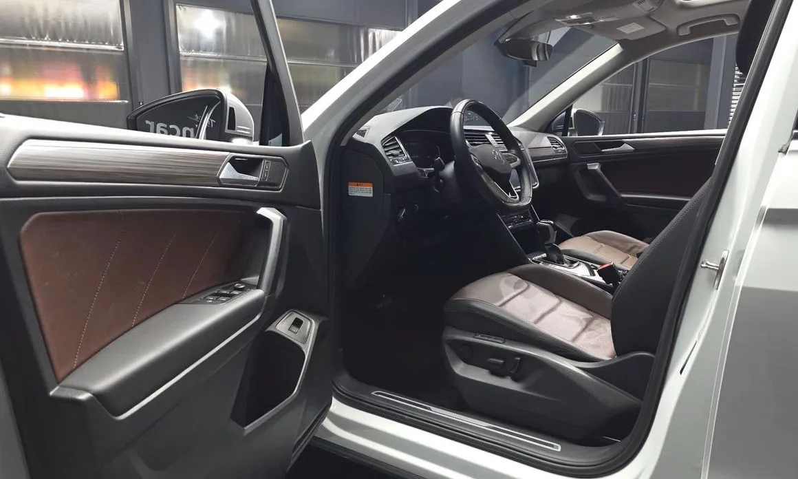 Volkswagen Tiguan — фото 8