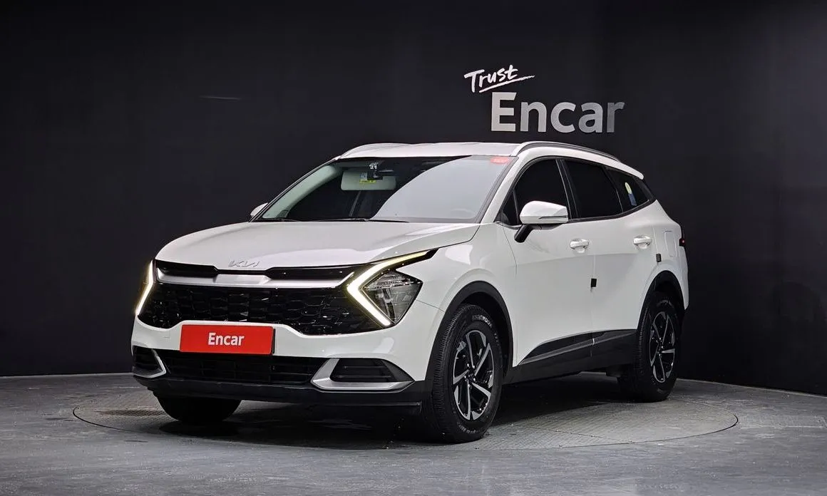 Kia Sportage — фото 1